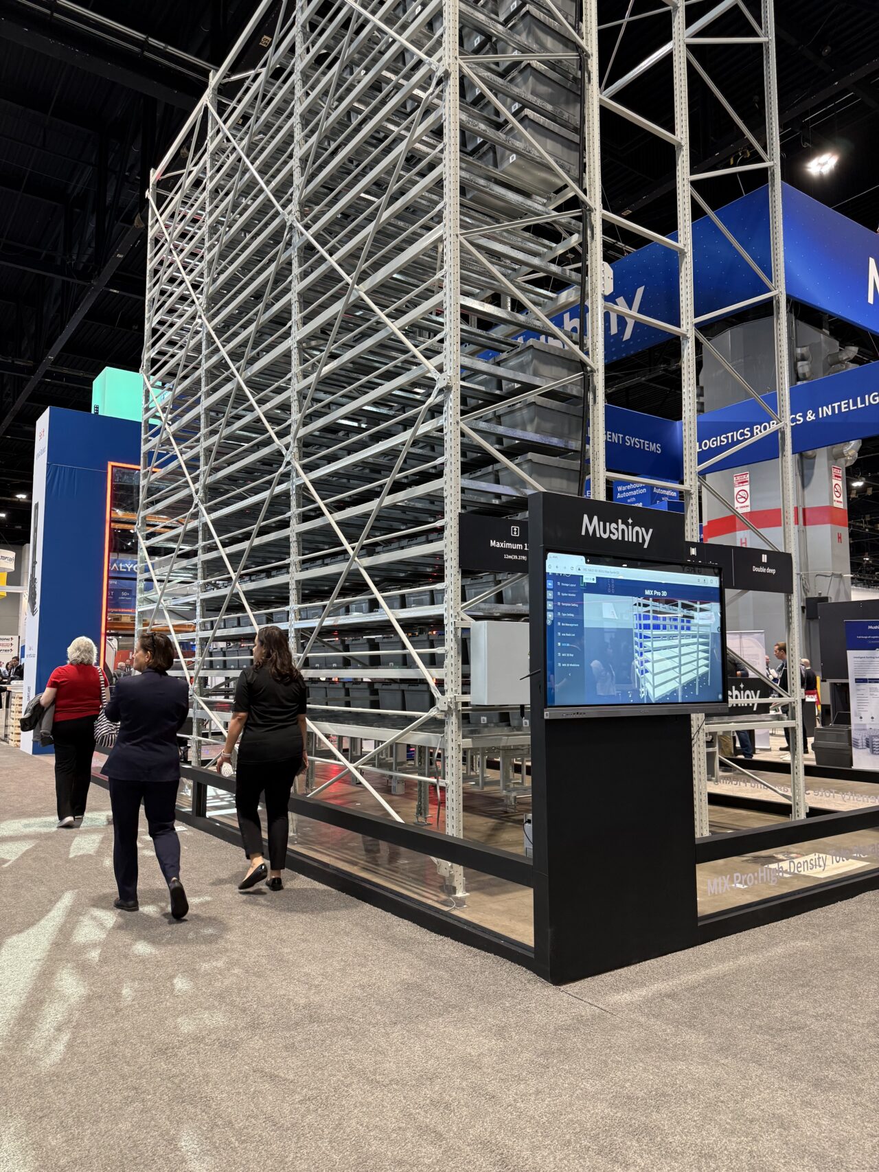 ProMat warehouse shelving and robots
